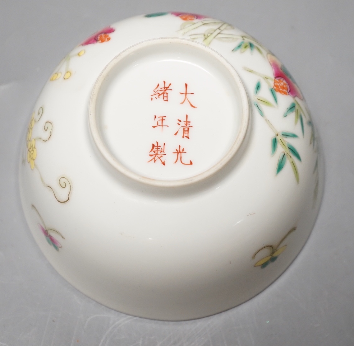 A Chinese famille rose ‘pomegranate’ bowl - 6.5cm high